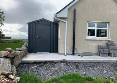 4-Morley Garden Sheds - Green Shed beside House